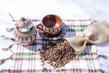 Coffee grinder, coffee beans and cups decoration