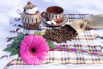 Coffee grinder, coffee beans and cups decoration
