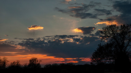 Fototapeta premium Dusk in the country with a dramatic sunset