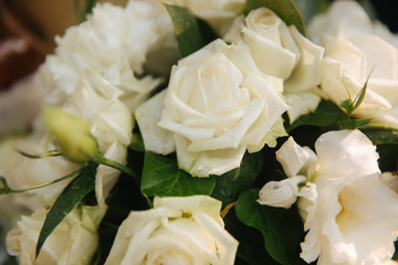 Fototapeta na wymiar Flowers on wedding drcor, green and white color