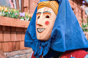 Carnival figure with blue hood .. Street Carnival in Southern Germany - Black Forest.