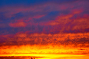 Colorful and dramatic sunset. Vivid abstract natural background.