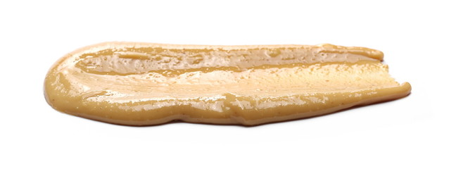 Peanut butter isolated on white background