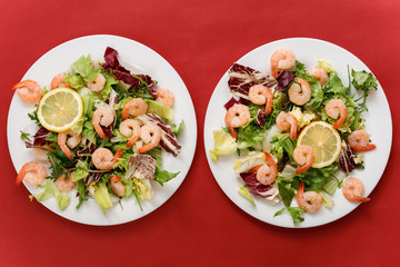 delicious shrimp with salad and lemon