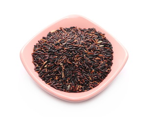 Wild black rice in bowl isolated on white background