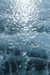 Sun reflects on frozen ground Lake Baikal