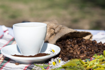 Coffee grinder, coffee beans and cups decoration