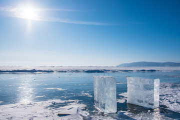 Ice cubes on frozen lake of Baikal during winter.
