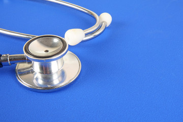 Fototapeta na wymiar Medical Concept with stethoscope ,syringe isolated on blue background. Copy Space