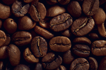 Roasted coffee beans background. macro close up photo
