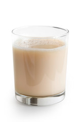 Glass of vegan milk isolated on white.