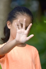 Diverse Female Youngster Gesturing Stop