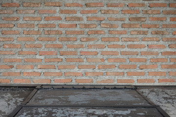 Brick wall with metal steel ground