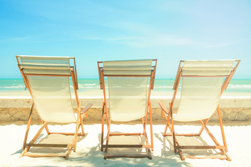 Three beach chairs, warm toned color filter applied