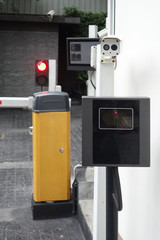 Fototapeta premium Entrance security system with smart pass card, automatic fence and surveillance camera