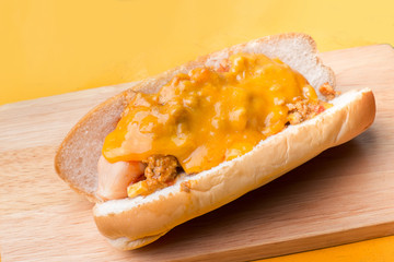 Hot dog cheese on wooden platter