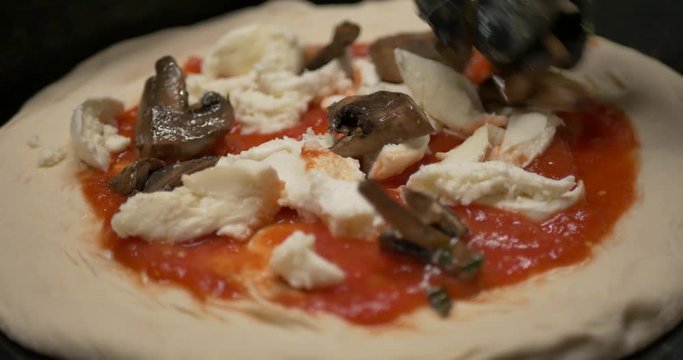 Closeup of making pizza 24 fps 4K
