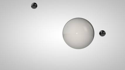 3D illustration of black and white balls, one large and two small balls. Spheres in the air, isolated on a white background. 3D rendering of an abstraction. Space with geometric, round objects.