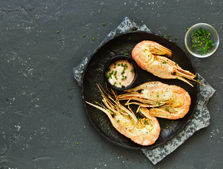 Fried king prawns with aioli sauce.