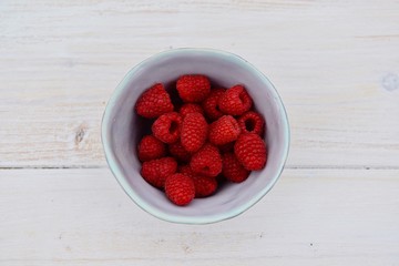fresh raspberries in a bowl