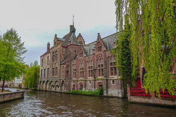 Fototapeta na wymiar Old classic buildings along the river in Belgium