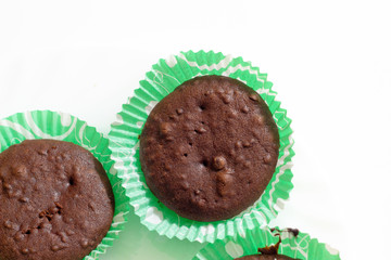 Sweet chocolate muffins with pieces of chocolate.