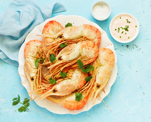 Fried king prawns with aioli sauce.