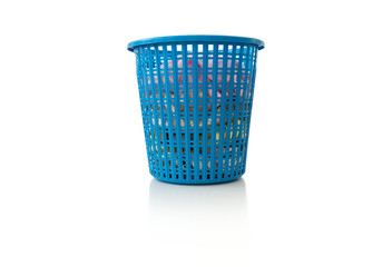 Fototapeta na wymiar Clothes in a laundry wooden basket on white background