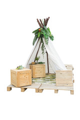 Tee Pee tent with flowers and wooden boxes for garden decoration or outdoor party props. Isolated on white background with clipping path applied for montages work