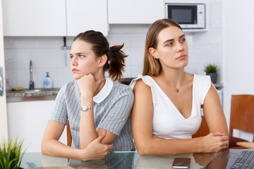 Two upset girls after quarrel
