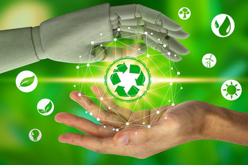 Robot hand protect and human hand holding with virtual environment icons over the network connection on nature background, Artificial Intelligence and Technology ecology concept.