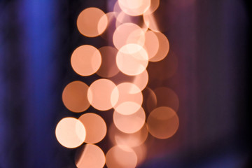 abstract gold and orange background with soft blurry bokeh light effect