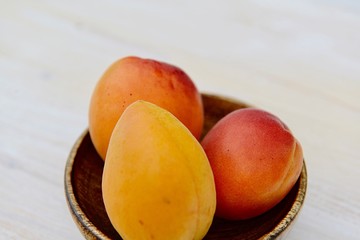 fresh apricots in a bowl