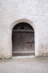 Fototapeta na wymiar Little wooden door, ancient old European style