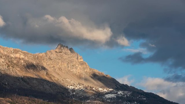 Aiguilles de Chabrieres (Chabrieres Needles) and passing clouds in Winter. Time-lapse. Ecrins national Park, Hautes-Alpes, European Alps, France
