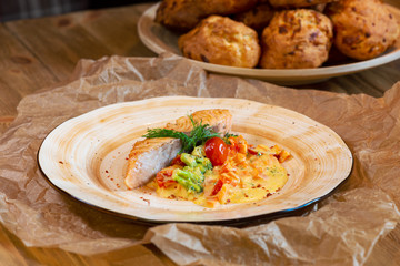 fish garnished with vegetables