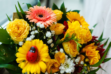 Bunch of flowers with gerbera daisy and sunflowers