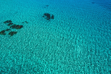 Transparent turquoise sea water, natural background. Sithonia, Chalkidiki, Greece