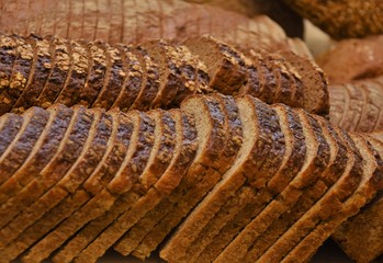 sliced rye bread in bread slicer