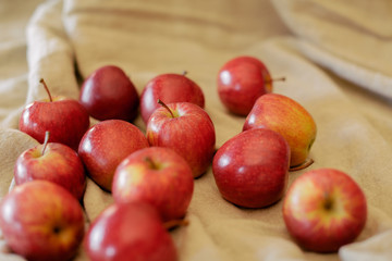 Red apples background. Heap of ripe red apples on vintage background. 