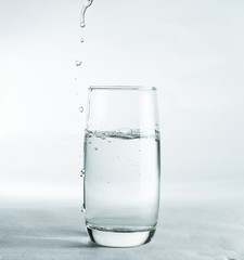 Glass of clean water isolated on white background