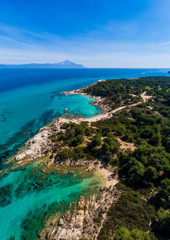 Fototapeta na wymiar Kavourotrypes or Orange is a small paradise of small beaches located between Armenistis and Platanitsi in Sithonia, Chalkidiki, Greece