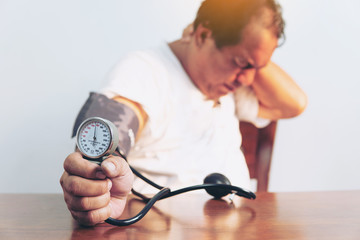 Very high blood pressure ,Hypertensive patient performing a blood pressure test .Health and Medical...