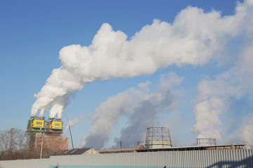 Naklejka premium Thick technical smoke comes from the pipes