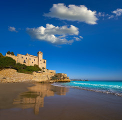 Fototapeta na wymiar Cala La Jovera beach under Tamarit castle