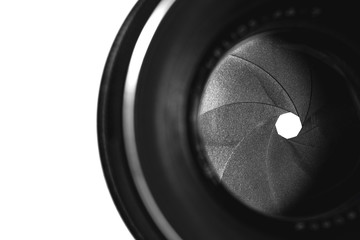 Macro closing aperture of camera lens on the white background