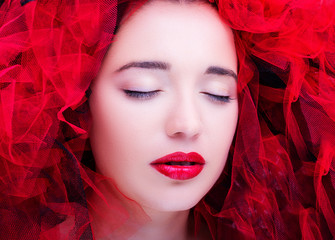Beautiful young model with red lips. Gorgeous Woman Face.