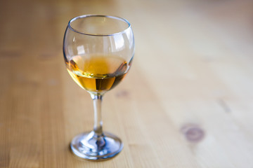 Wine glass on the wood ground