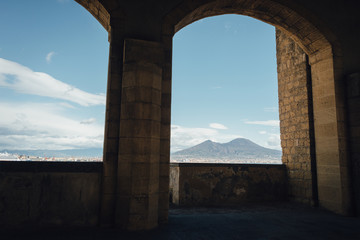 Vesuvius view through the castle Castel dell'Ovo arches