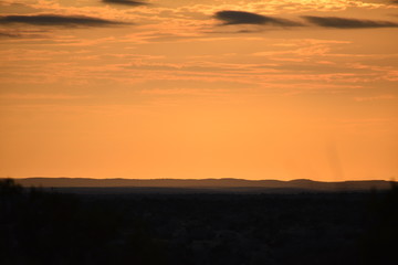 Fototapeta na wymiar orange sunset in the mountains